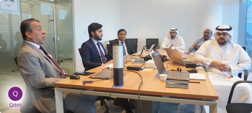 Qdot ISO consultants meeting with a client