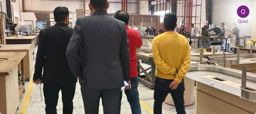 Qdot ISO consultants reviewing client operations