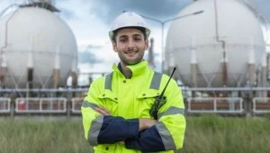 Industrial worker at facility site supporting energy management and operational efficiency improvements in Qatar