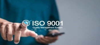 ISO 9001 quality management system concept with person selecting quality options on screen 